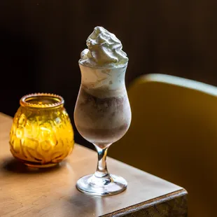 a drink with whipped cream