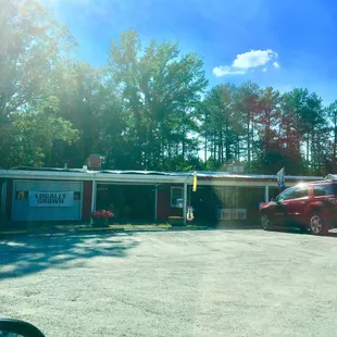 a car parked in front of the store