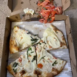 So many tomatoes the crust was wet and doughy. Didn't fully cook because of too much water