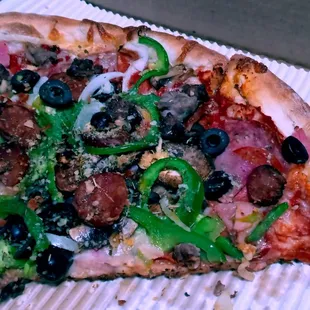 Prego Pizza... it has everything on it! Linguica, ham sausage salami pepperoni and even hamburger which I didn't care for.