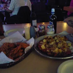 two trays of food on a table
