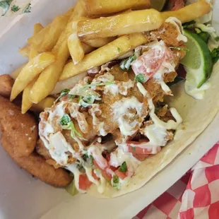 Fried fish taco, fries, hush puppies