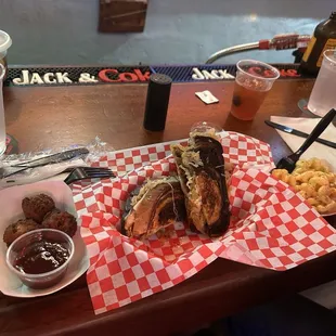 Grouper Reuben sandwich, hush puppies, mac and cheese w/Old Fashioned Cocktails.