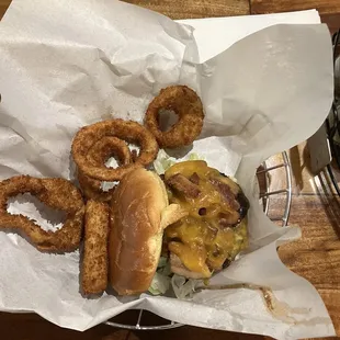 Bacon Cheddar burger with onion rings.