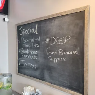 a menu on a chalkboard