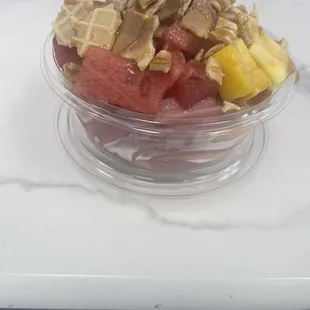 Acai fruit bowl - wild berry &amp; peach Acai twist w/watermelon, mango, pineapple, crunched waffle cone and caramel drizzle.