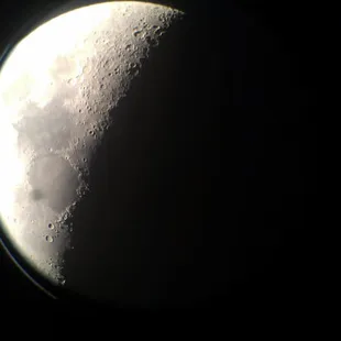The moon seen through sky bar's telescope. Amazing!