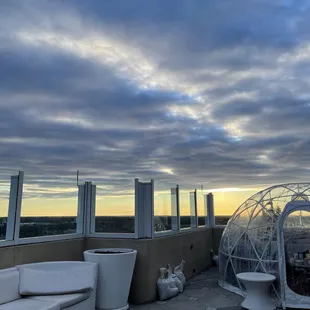 the view of the city from the top of a building