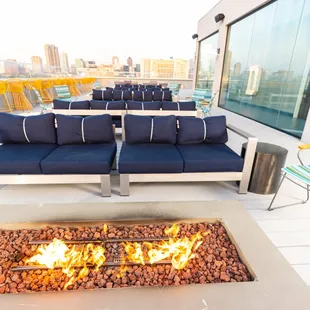 Outdoor seating with a firepit.