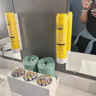 Admiring the lovely essentials in the women's Restroom!