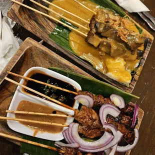 two trays of food on a table