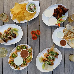 Chips &amp; Guacamole, Dragon Flame Chicken Wings, Sky Creek Kitchen Quesadilla, Slow Cooked Pork Tacos, Chicken Nachos, and Veggie Street Taco