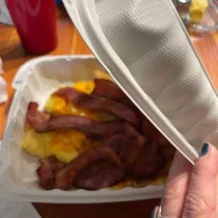 Plastic trash takeout container. A no go.