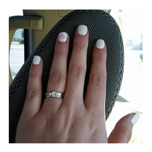Kevin was out today, but another lady did a great job!! White nails with color 83 heart!