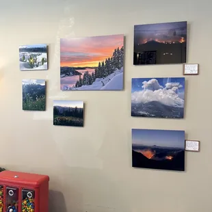 Art for sale and cribbage board on table
