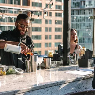 Handcrafted cocktails with skyline views