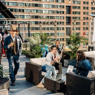 a group of people sitting outside