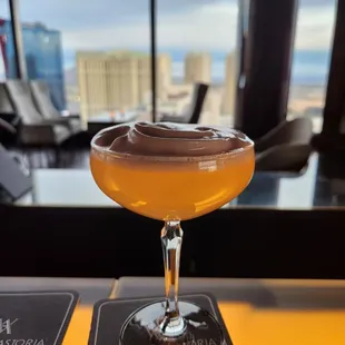 a cocktail in a coupe glass