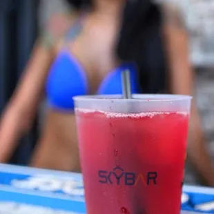 a woman in a bikini in the background