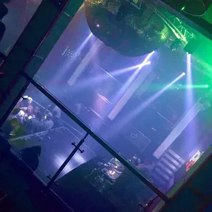 View of DJ and dance floor from second level