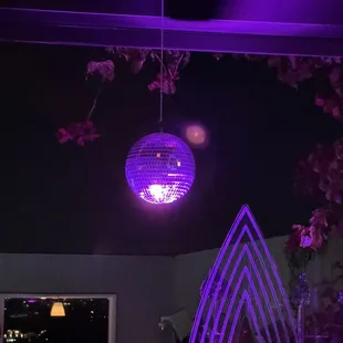 a disco ball hanging from the ceiling