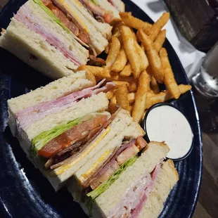 Club sandwich not toasted and seasoned fries