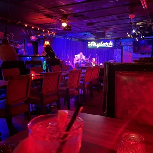 a glass of cocktail on a table