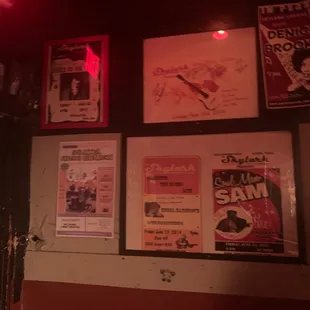 a wall full of posters