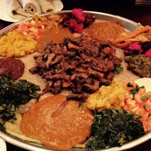 Veggie combo &amp; yawaze tibs in the center