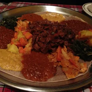 Beef tibs and veggie combo for two.