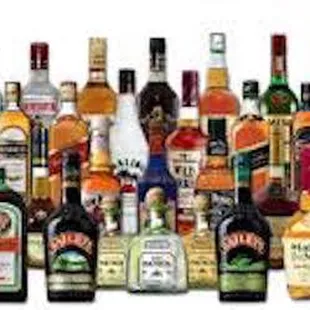 a large collection of liquor bottles