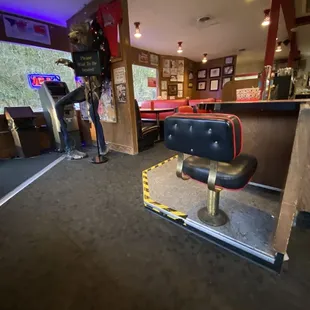a barber chair in the foreground