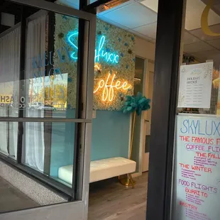 the entrance to a coffee shop