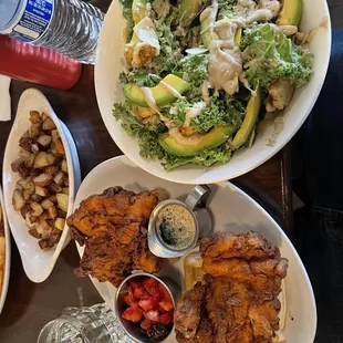 Chicken and waffles Kale and Avocado Caesar Salad Home fries