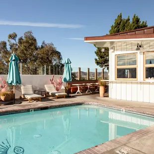 Poolside patio dining at Norman Restaurant + Bar