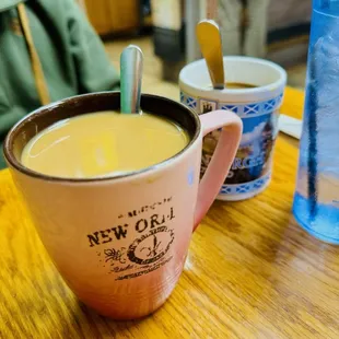 two cups of coffee on a table