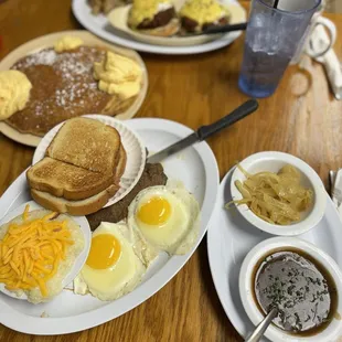 a table full of breakfast foods