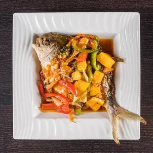 Tod Pla                                deep fried whole golden pompano smothered in galic mango sauce