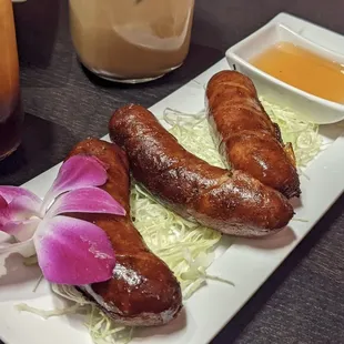 Lao style sausages.Deep fried pork sausages with lemon grass and kaffir lime leaf.