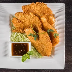 Crispy fish                                      battered and fried fish fillet served with house special garlic sauce