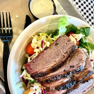 BBQ Salad Specialty with sliced brisket with spicy jalapeño ranch. ($9.45)