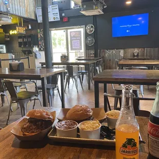 Seating area, Rib and brisket sandwich + sides