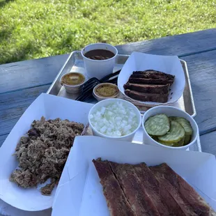 a variety of meats and sides