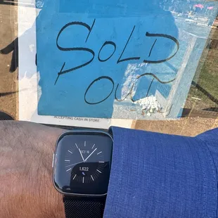 Showing the time and the sold out sign!