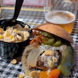 El Jefe Slider (brisket, queso, grilled veggies, crunchy fritos, jalapenos) and a side of street corn. Pairs well with Zilker's Marco IPA