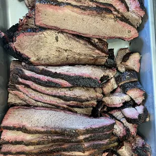 Brisket sliced on site for catering event.