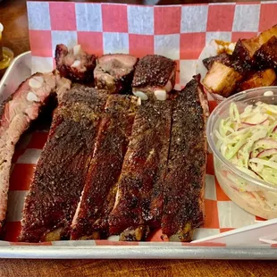 Ribs, burnt ends, slaw and sauces.