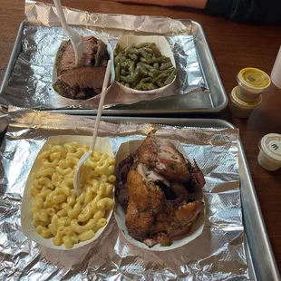 Top tray is a brisket meal $12.99 the bottom tray is pulled chicken dinner $10.49. Both are DELICIOUS!! A diamond in the ruff!!