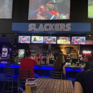 people sitting at the bar