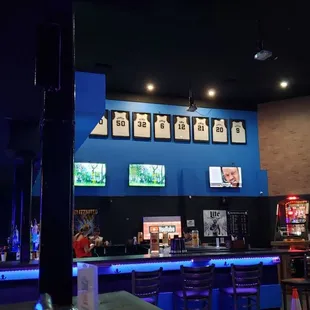 people sitting at the bar